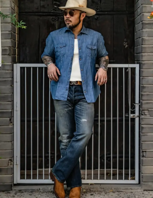 @trad_band Vibes.

With the Masterpiece “Gonzo” Light Blue Chambray Linen Western Shirt.

Available worldwide in Limited Quantity.

Inspired by early 1960s Western shirts and revisited with a unique Italian touch, the “Gonzo” Light Blue Chambray Linen Western Shirt represents an authentic garment made of a special Chambray Cotton-Linen blend from Italy, Stone Washed.

Our Chambray Cotton-Linen blend is a beautifully woven fabric that combines the casual elegance of chambray with the natural comfort of cotton and linen. It combines the best qualities of both natural fibers, the softness and breathability of cotton with the lightweight strength and crisp texture of linen. This blend offers a perfect balance of comfort and durability, making it ideal for warm-weather.

The fabric has been Stone Washed to get the best softness, worn-in feel and a distinct vintage look.

The Western shirt appeared at the beginning of the 19th century, during the conquest of the West. Thanks to the Italian “Spaghetti Western” films like “For a Few Dollars More” by Sergio Leone, from the 60s the Western shirt become a timeless icon, a wardrobe must-have.

The attention to detail makes it a rare and authentic Western Shirt Hand Made in Italy.

Proudly Hand Made in Italy